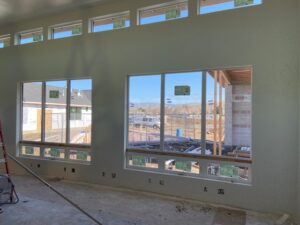 A room with windows being installed in a home.